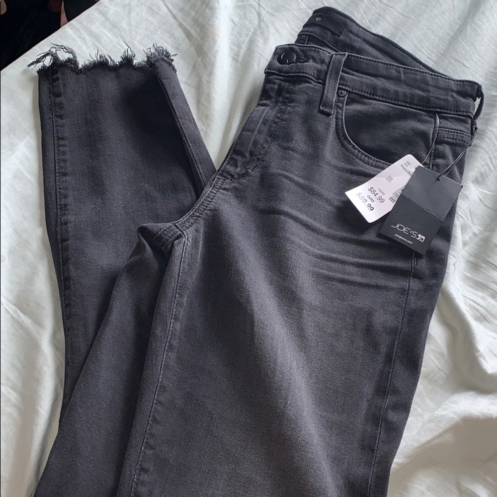 Brand new distressed jeans